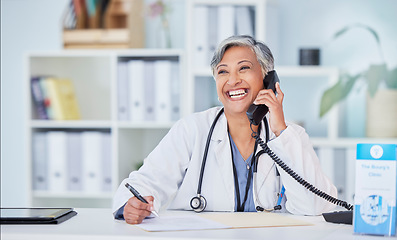 Image showing Doctor, senior woman in office and phone call, telehealth and happy writing with health insurance and paperwork. Healthcare, wellness and communication, documents and information with compliance