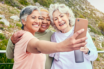 Image showing Nature, fitness or selfie of senior friends on social media together for outdoor exercise in retirement. Photo, diversity or happy elderly women hiking to take pictures on break in training in park