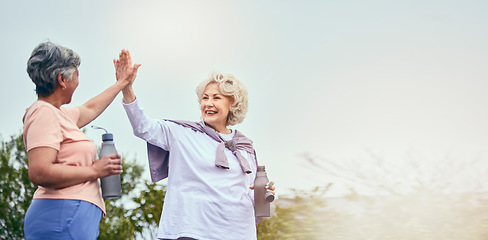 Image showing Senior women, walking and high five for motivation and workout success from outdoor fitness. Banner, elderly friends and happy from sport and exercise together with support smile and mockup space
