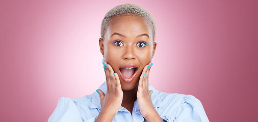 Image showing Wow, surprise and black woman with hands on face in studio for beauty, sale or news on pink background. Wtf, shock and portrait of African female model shocked by cosmetic, deal or promo announcement