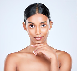 Image showing Studio portrait of Indian woman for dermatology, skincare and cosmetics for salon aesthetic. Beauty, spa and face of isolated person for wellness, satisfaction and facial glow on white background