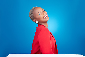 Image showing Cosmetics, laugh and young black woman in a studio with makeup, glamour and face routine. Happy, smile and African female model with a cosmetology facial treatment isolated by a blue background.