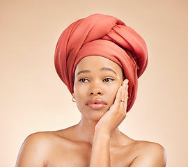 Image showing Thinking, beauty and black woman in studio with hair scarf, idea or natural cosmetic questions on brown background. Face, skincare and African lady model with head wrap, wellness or glow treatment