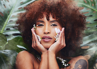 Image showing Flowers, beauty and portrait of black woman with skincare, cosmetics and creative or eco friendly art in nature or forest. Natural, face and model with flower makeup and healthy or organic skin care