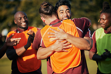 Image showing Hug, sports and rugby team celebrate teamwork, achievement or winning game, match or tournament competition. Embrace, group winner celebration and men happy, excited or applause for challenge success