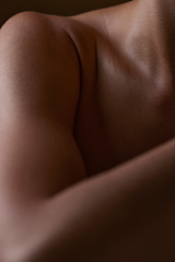 Image showing Body, closeup and healthy skin of black woman, shoulder or natural glow from skincare in studio with antiaging cosmetics. Beauty, self care and arm of model with clean, hygiene and aesthetic wellness
