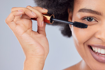 Image showing Makeup, beauty and portrait of woman with mascara in studio for wellness, skincare product and cosmetics. Salon, aesthetic and half face of person with eyelash wand for glamour, makeover and glow