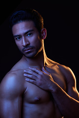 Image showing Sexy, dark portrait and man on black background in fitness inspiration, beauty aesthetic or sensual fantasy. Erotic, sexual body and topless seductive male model with muscle, studio and neon lighting