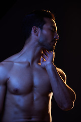Image showing Sexy, topless and sensual man on black background in fitness inspiration, beauty aesthetic or fantasy. Erotic art, sexual body or seductive male model with muscle motivation, studio and dark lighting