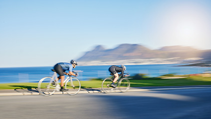 Image showing Action, fitness and cyclist on bicycle on road together in mountain with helmet, exercise adventure and speed. Cycling race, nature and man with bike for fast workout, training motivation or energy.