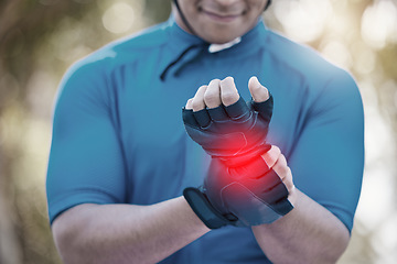 Image showing Man, cycling or hand on wrist pain, joint injury or emergency in training, workout or fitness exercise. Injured cyclist, accident or closeup of hurt athlete with problem in race or activity in nature