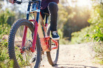 Image showing Nature, cycling and feet with a bicycle for travel, fitness or training on the mountain. Closeup, morning and legs of a person with a bike on a path for a triathlon, exercise or sports adventure