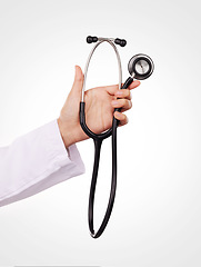 Image showing Stethoscope in hand, doctor and health, cardiology and wellness with equipment isolated on white background. Cardiovascular healthcare, listen to heart beat and person in studio with medical tools