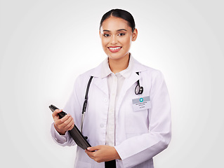Image showing Happy woman, doctor and portrait with tablet in healthcare research or online advice against a studio background. Female person or medical professional smile with technology for Telehealth on mockup