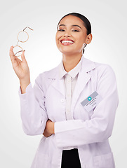 Image showing Woman, glasses in portrait and smile of optician in studio isolated on a white background. Happy face, ophthalmologist and vision frame of medical professional optometrist confident in eye healthcare