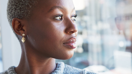 Image showing Thinking, professional and black woman by window in office with ideas, brainstorming and planning. Creative worker, business and face of person by glass thoughtful for strategy, future and solution