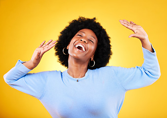 Image showing Happy, woman and dance for success in studio with freedom, celebrate party and winning competition bonus. Young african model singing for celebration, energy or excited for music on yellow background