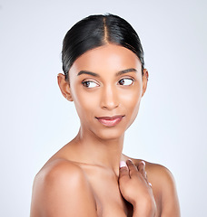 Image showing Face of Indian woman for skincare, beauty and cosmetics on white background for salon aesthetic. Dermatology, spa and isolated person touch for natural wellness, satisfaction or facial glow in studio