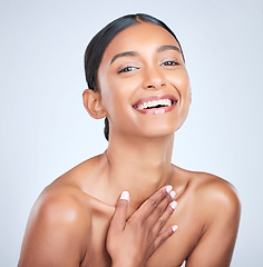 Image showing Woman, natural beauty and face with dermatology and skincare isolated on white background. Portrait, happy Indian model with wellness and skin glow, facial for cosmetic care and clean in a studio