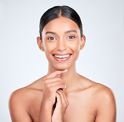 Image showing Skincare, glow and portrait of a woman on a white background for cosmetics, dermatology or wellness. Happy, spa and an Indian model or girl with healthy skin, confidence or beauty from cosmetology