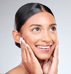 Image showing Face, beauty and smile with a woman thinking about health or wellness in studio on white background. Idea, skincare and natural with a happy young model feeling her skin after cosmetic treatment