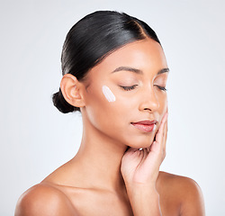 Image showing Shine, cream or woman with skincare, dermatology or wellness on a white studio background. Person, aesthetic or model with creme, moisturiser or luxury with self care, beauty or cosmetics with lotion