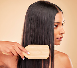 Image showing Hair, woman and brush for beauty and cosmetic tools, shampoo and keratin treatment shine on studio background. Texture, wellness and haircare equipment, straight hairstyle and growth with routine