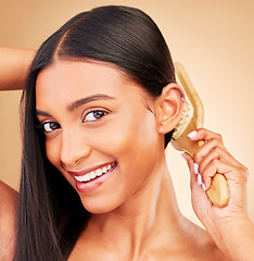 Image showing Hair, brush and beauty with woman in portrait, keratin treatment and routine isolated on studio background. Shine, salon hairstyle and haircare with texture, growth and cosmetic care with smile