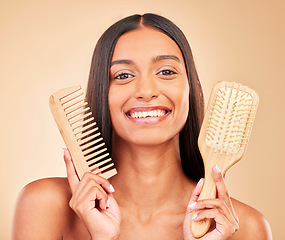 Image showing Brush, comb and portrait of woman in studio with clean salon treatment hairstyle for wellness. Health, hair care and young female model with tools for haircut maintenance isolated by brown background