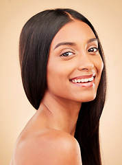 Image showing Hair, woman and face for beauty and cosmetics, shampoo and keratin treatment isolated on studio background. Smile in portrait, wellness and haircare, straight hairstyle and natural makeup with growth