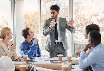 Image showing Businessman, presentation and coaching in meeting, planning or brainstorming in team strategy at office. Man or speaker talking to business people, training staff or project plan ideas in leadership