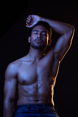 Image showing Bodybuilder man, abdomen and shadow in studio with wellness, healthy body and black background. Young guy, fitness and silhouette in dark, stomach muscle and strong with ideas, health and shirtless