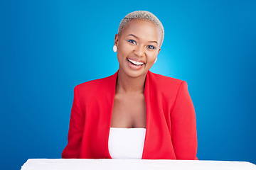 Image showing African, entrepreneur and portrait of woman in studio on blue background with confidence of boss in Nigeria startup. Face, smile or happiness of business, employee or corporate entrepreneurship