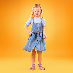 Image showing Sad, portrait and girl child in studio with bad news, feedback or negative review on orange background. Face, frown and kid with emoji disappointed expression, angry or tantrum, reaction or behavior