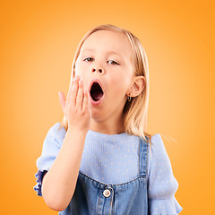 Image showing Tired, bored and yawn with portrait of child in studio for fatigue, exhausted and sleepy. Lazy, youth and preschool with face of young girl on orange background for insomnia, nap time and mockup