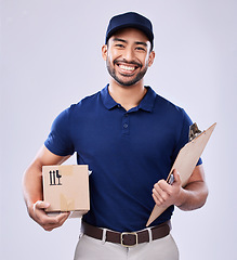 Image showing Clipboard, portrait and delivery guy with box in studio, safe transport for ecommerce supplier product. Package, logistics and happy courier man on white background for online sales and services.