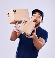 Image showing Courier box, drop and delivery man mistake, problem and accident when shipping product, shopping stock or studio mail. Supply chain crisis, package cargo and export person fail on white background
