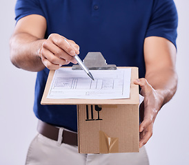 Image showing Pen, signature and hands of delivery man with box in studio, safe transport for ecommerce product. Package, logistics and documents to sign, courier person on white background for sales and services.