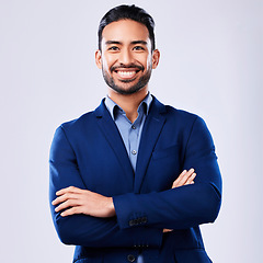 Image showing Portrait, happy and business man with arms crossed in studio isolated on a white background mockup space. Professional, entrepreneur and confident worker, employee and Mexican consultant in suit.