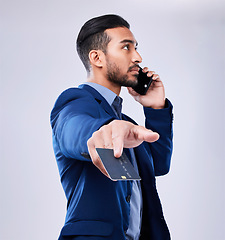 Image showing Business man, credit card or phone call in studio for communication or fintech payment. Asian person with smartphone for membership subscription, account authorization or bank info on grey background