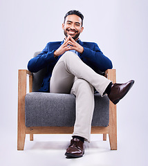 Image showing Portrait, confident and business man on chair in studio isolated on a white background. Professional lawyer, consultant and happy attorney, employee and Mexican worker in corporate suit at law firm