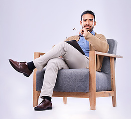 Image showing Portrait, tablet and psychology with a man in a chair on white background in studio to listen for diagnosis. Psychologist mental health and listening with a person counseling during a therapy session