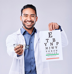 Image showing Man, glasses and eye chart of ophthalmologist in portrait at studio isolated on white background. Face, spectacles and happy optometrist with snellen test document for vision, healthcare or wellness