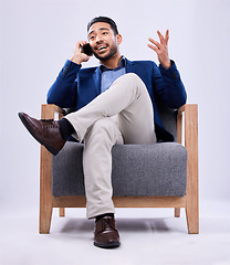 Image showing Studio phone call, chair and professional man, real estate agent and business discussion, conversation and networking. Smartphone, communication and sitting realtor contact user on white background