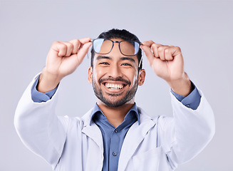 Image showing Man hands, glasses and portrait of ophthalmologist at studio isolated on a white background. Frame, spectacles and happy face of optometrist, optician and doctor with vision lens, health and wellness