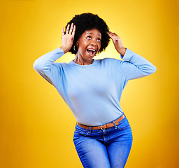 Image showing Happy black woman, wow and excited winner in celebration isolated on a yellow background in studio. Smile, surprise and shocked African person in achievement success, bonus promotion and good news.