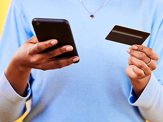 Image showing Woman, hands and phone with credit card in online shopping, payment or banking for eft or purchase. Closeup of female person or shopper with debit and mobile smartphone app in ecommerce or buying