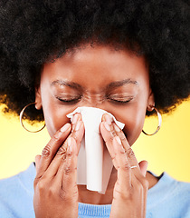 Image showing Nose, face and sneeze of sick woman in studio for cold, allergies and medical virus on yellow background. African model, tissue and ill health from sinusitis, allergy and bacteria of winter infection