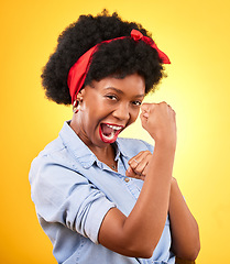 Image showing Muscle, flex and success with portrait of black woman in studio for power, motivation and energy. Empowerment, pride and champion with person and fist on yellow background for challenge and hard work