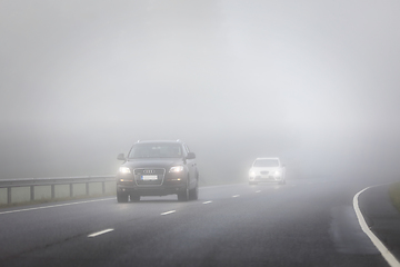 Image showing Cars Driving on Highway Through the Fog